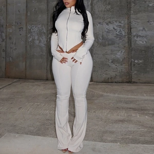 Slim fit two-piece set featuring long sleeve zip-up top and high waist flared trousers