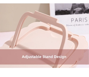 Detail showing the adjustable stand design and wavy edge of the pink desktop makeup mirror