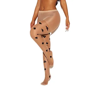 Sheer pantyhose for women with playing card pattern prints in a vintage subculture style
