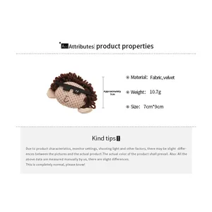 Detailed size chart showing 7x9cm dimensions for the plush fabric face brooch accessory
