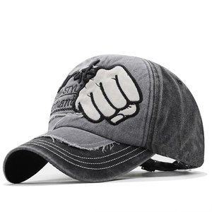 Distressed vintage washed baseball cap with white fist embroidery on front in dark grey
