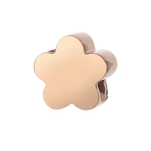 Macro shot of rose gold five-petal flower bead accessory with clear metal texture