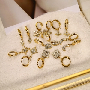Gold stainless steel hoop earrings set with rhinestone heart, star and butterfly charms