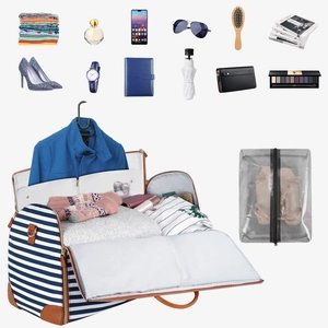 Inside view of striped travel garment bag showing spacious suit storage and mesh pouch