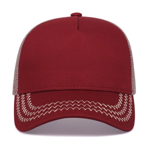 Classic burgundy trucker cap with breathable mesh back and decorative brim stitching