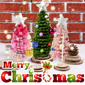 DIY colorful pipe cleaner Christmas trees on wooden bases with festive star ornaments