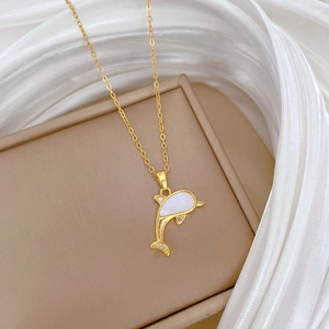 Elegant gold titanium steel necklace with a shell dolphin pendant and sparkling crystals