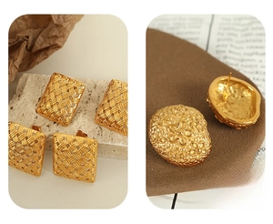 Detailed macro view of gold-plated square braided and floral relief stud earrings