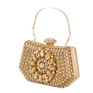 Luxurious gold crystal evening clutch bag with large diamond flower and metal handle