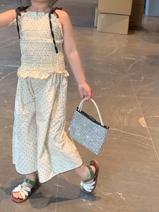 Close-up of a stylish silver rhinestone handbag for girls with sparkling accents
