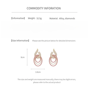Detailed chart showing alloy and diamond earring specs, size 8cm by 3.8cm, weight 32.5g