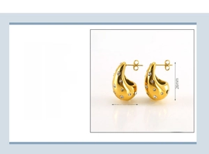 Detail view of 18K gold plated stainless steel teardrop earrings with crystal zircon inlay