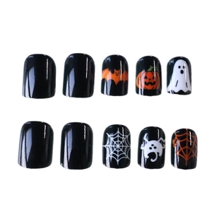 Halloween short square press-on nails featuring pumpkin, bat and ghost patterns on black