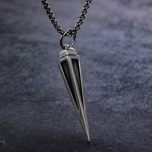 Retro stainless steel triangle cone pendant necklace with chunky chain on stone surface