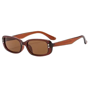 Retro square sunglasses for women with brown frame and silver heart stud accents