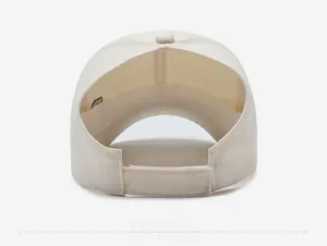 Back view of cream cotton baseball cap with adjustable Velcro strap closure