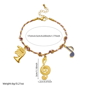 Bohemian braided music charm bracelet with golden treble clef and note pendants