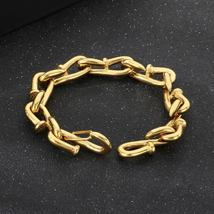 Detailed view of gold-plated stainless steel nail link chain bracelet for men