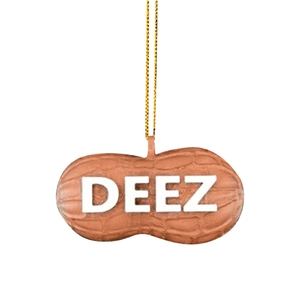 Close-up of peanut-shaped Christmas ornament with white 3D text and golden hanging cord