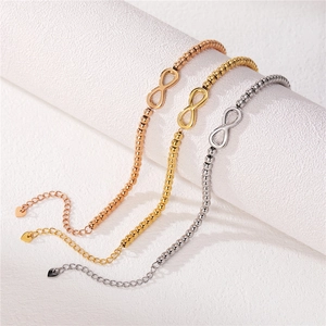 Three-piece infinity symbol beaded bracelet set in rose gold, gold, and silver finishes