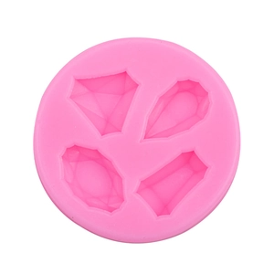 Pink round silicone gemstone mold with four diamond facet cavities for resin and chocolate