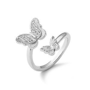 Detail of silver butterfly ring featuring micro-pave crystals and adjustable open band
