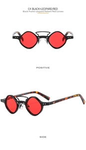 Detail of punk small frame sunglasses with red lenses and leopard temple design
