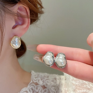 French vintage irregular baroque pearl earrings with metallic gold and silver plating