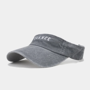 Detail of grey washed cotton sun visor with white CHANCE letter embroidery on front