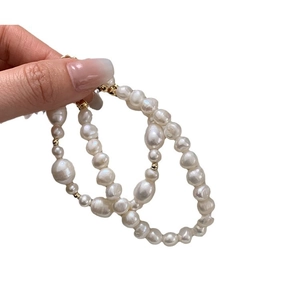 Baroque freshwater pearl bracelet set with gold beads and a minimalist design