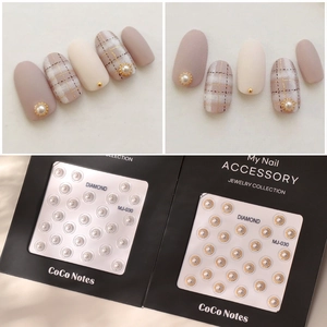 Detail view of MJ-030 5D bronzing nail stickers with pearl and gold rim accents