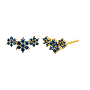 Detail view of gold angel wing earrings with vibrant blue zircon stone flower clusters