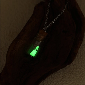 Luminous ghost in a glass bottle pendant necklace with green glow for Halloween party