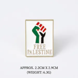 Detail of metal enamel pin featuring Free Palestine flag and gold-plated borders