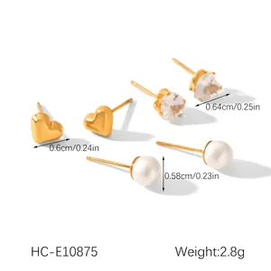 Detailed view of gold heart and pearl earring set with precise size measurements