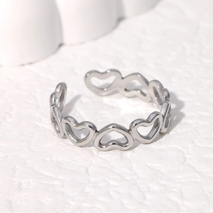 Adjustable silver heart-shaped open ring in polished stainless steel for women