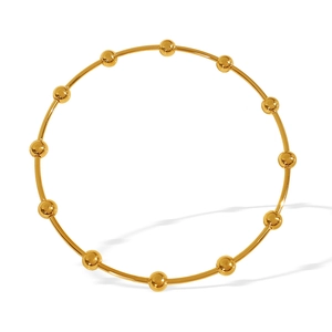 Minimalist gold-plated stainless steel bangle featuring elegant spherical bead accents