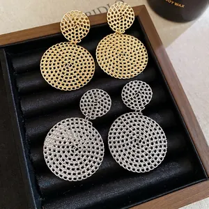 Western style hollow round pendant earrings with golden and silver mesh woven design