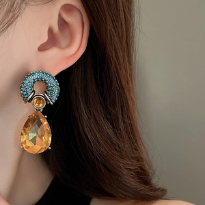 Teardrop amber crystal drop earrings with sparkling rhinestones in a vintage design