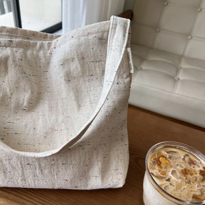 Borsa tote minimalista in tela beige con trama in filato nep colorato e logo simple wish