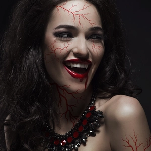 Detail of waterproof Halloween tattoo sticker featuring realistic red blood veins and scars