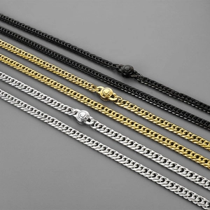 Close-up of 9mm stainless steel curb chains in black gold and silver with magnetic clasps