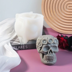 DIY Halloween skull silicone mold featuring sunflower wreath detail for candle making