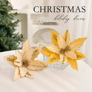 Elegant champagne gold poinsettia artificial flowers in a metal basket for Christmas decor