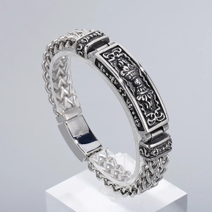 Vintage titanium steel mens bracelet with embossed totem and secure clasp closure