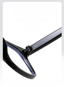 Detail of reinforced metal hinge on black square frames for smooth opening and closing