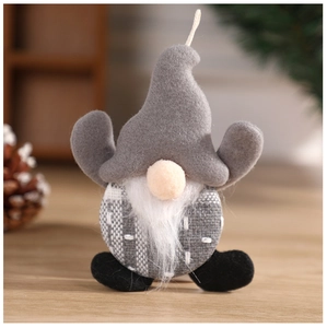 Detailed close-up of a plush grey Christmas gnome hanging ornament on a wooden surface