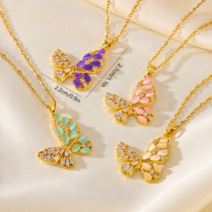 Detail view of colorful butterfly pendants with 2.7cm width dimensions on silk background