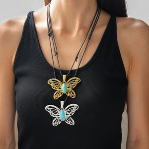 Ethnic hollow butterfly pendant necklace with turquoise stone and wax rope cord
