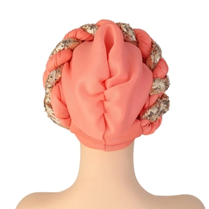 Detailed back view of coral turban with golden sequins and braided chiffon fabric layers